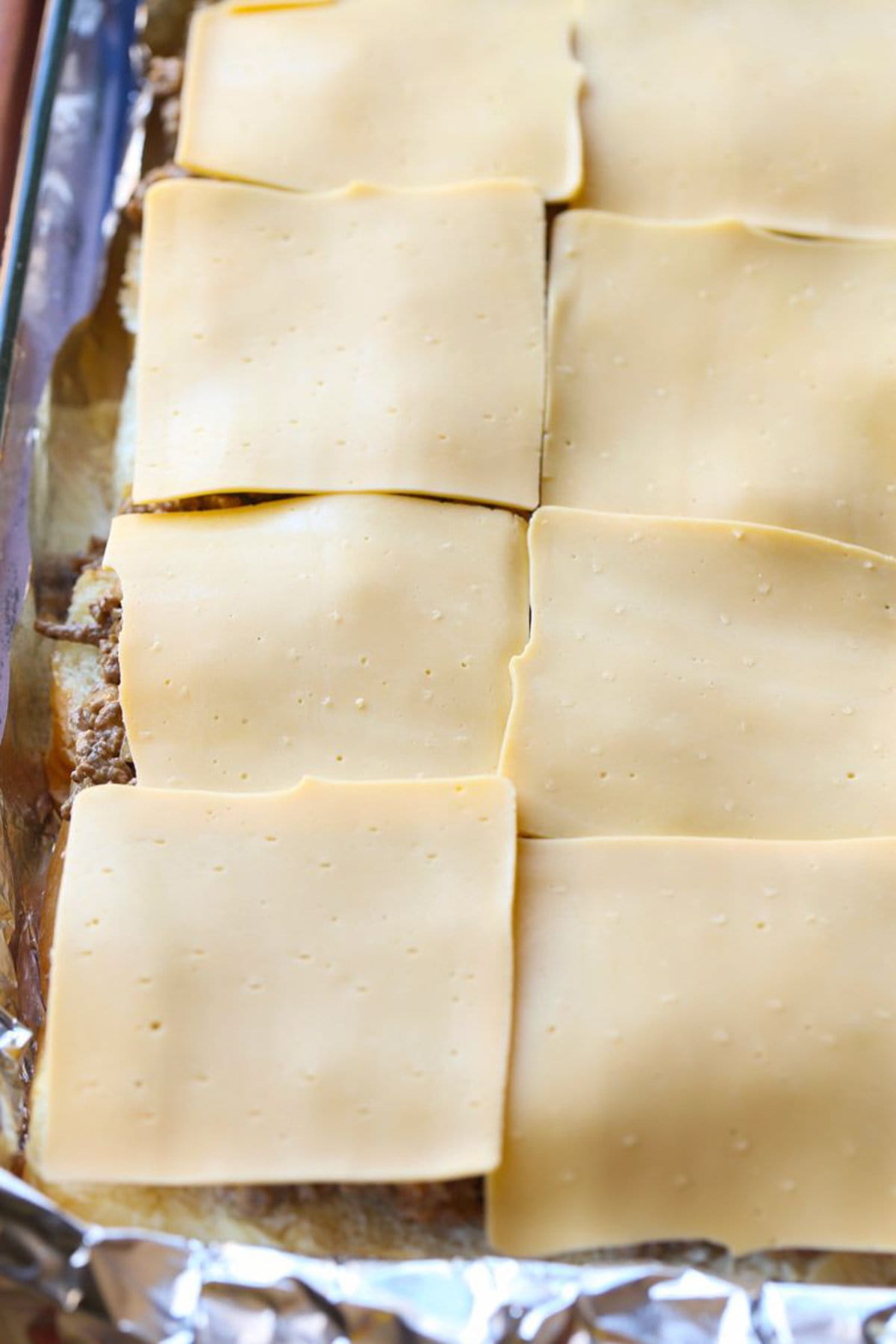 Cheese pressed onto Hawaiian rolls. 