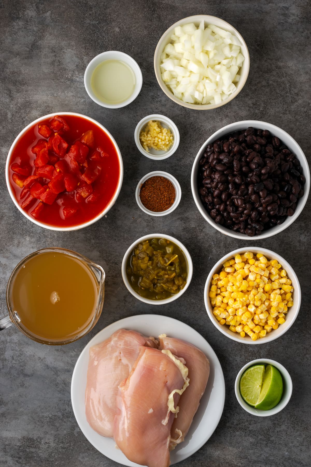 Smoky and flavorful Instant Pot chicken tortilla soup is a comforting one-pot meal that's easy to make any night of the week! The ingredients for instant pot chicken tortilla soup.