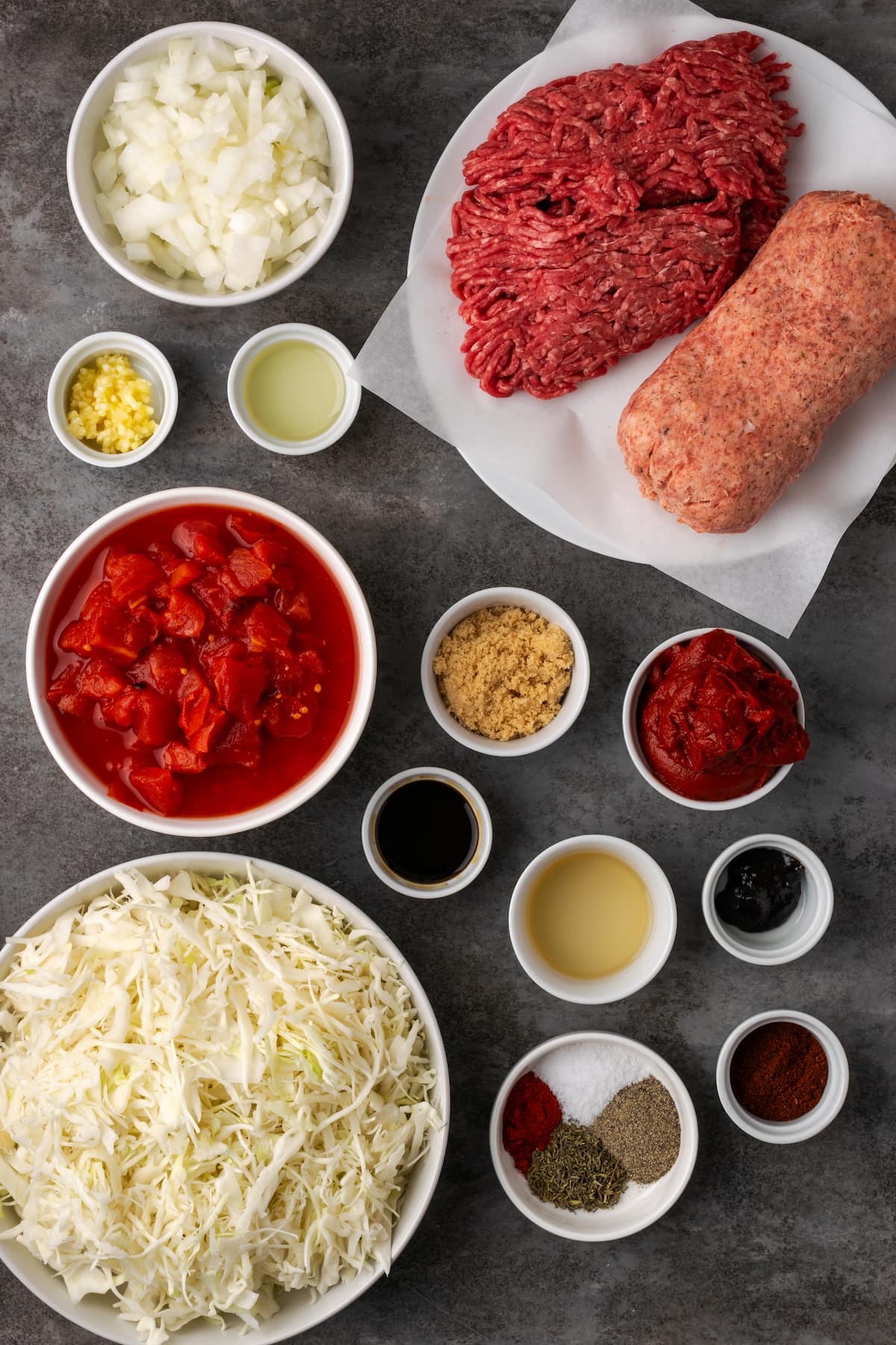 This easy unstuffed cabbage recipe is a savory one-pot meal made with juicy ground beef, pork, tangy fire-roasted tomatoes, and onions. Ingredients for unstuffed cabbage.