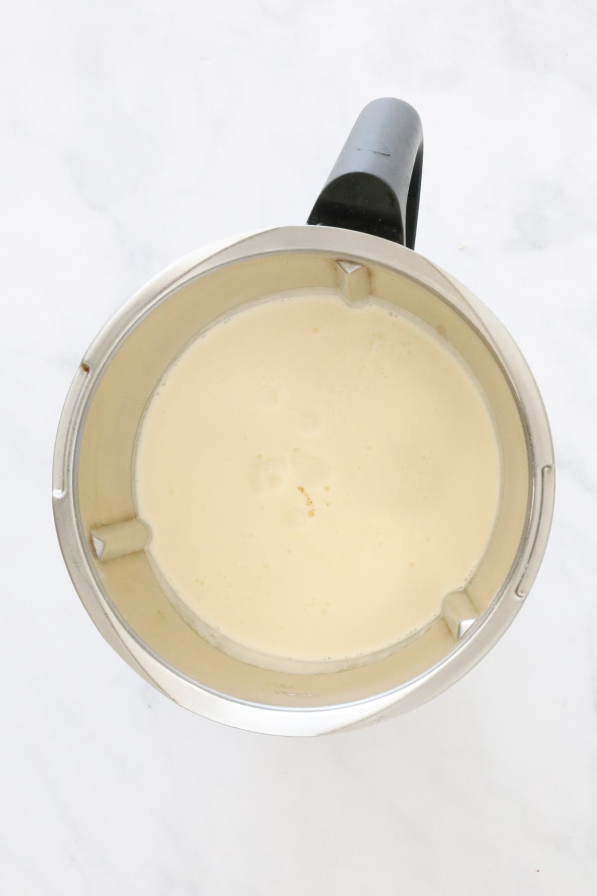 Creamy liquid in a Thermomix.