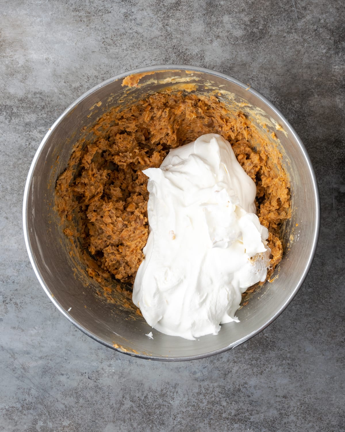 Creamy Butterfinger Pie is an easy dessert recipe that's loaded with Butterfinger candy bars! Treat yourself to this tasty peanut butter pie! Cool Whip is added into a bowl with the peanut butter and Butterfinger mixture for the pie filling.
