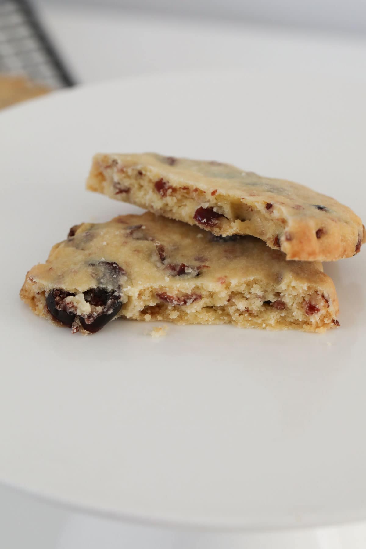 A shortbread cookie broken in half.