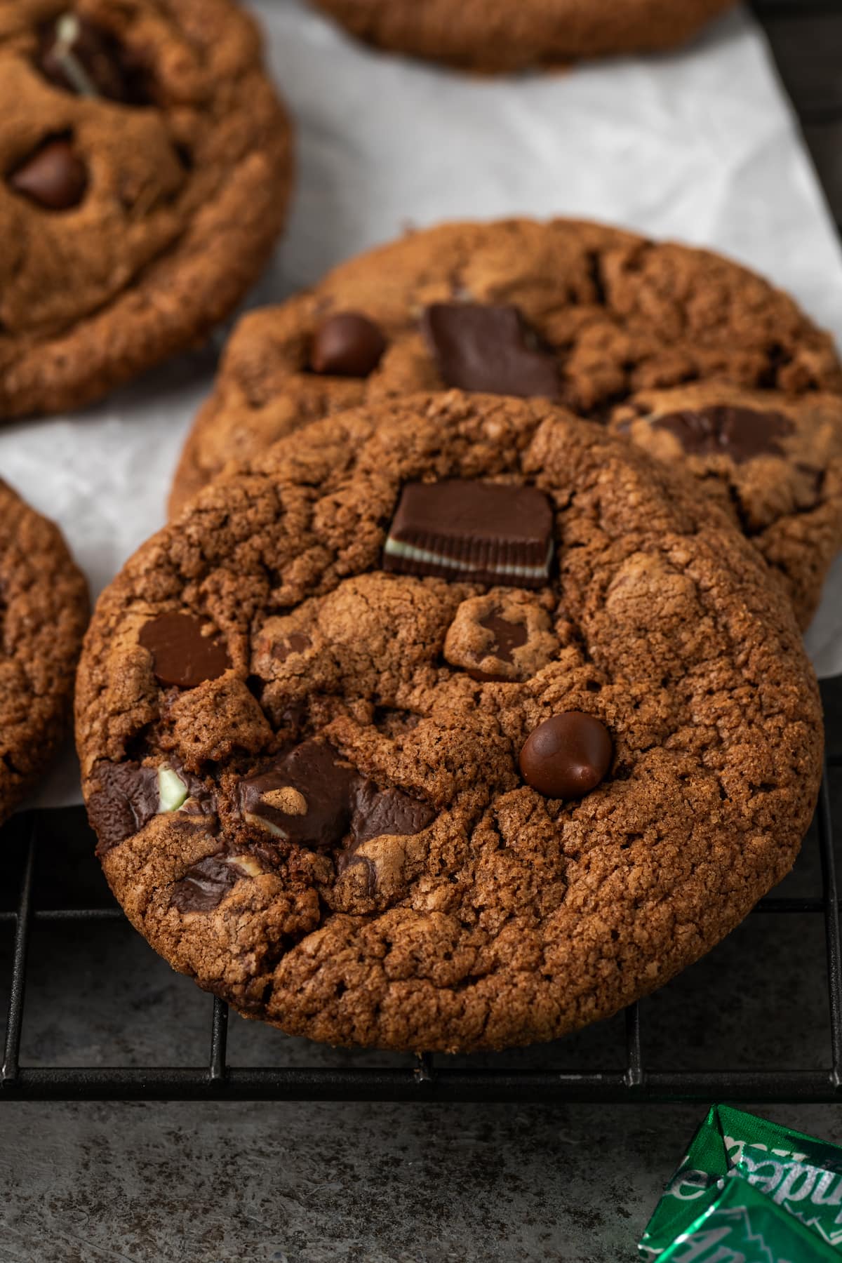 Double chocolate mint cookies on a wire rack.