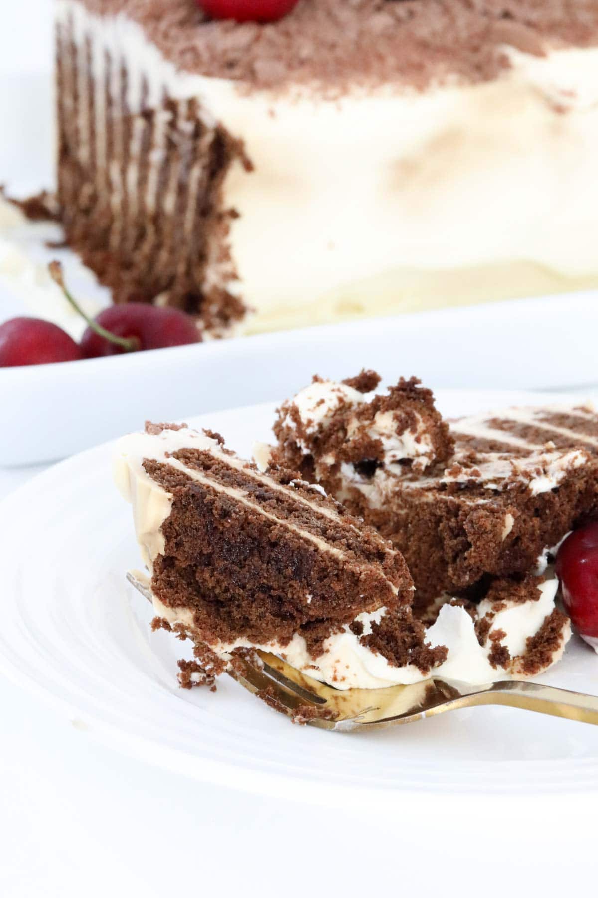 A piece of choc ripple cake on a fork.