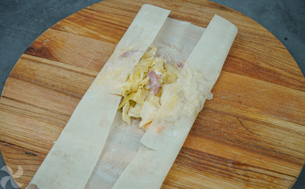 Rollitos de primavera con beicon y langostinos
