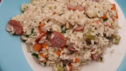 Risotto con salchichas, parmesano y polvo de avellanas