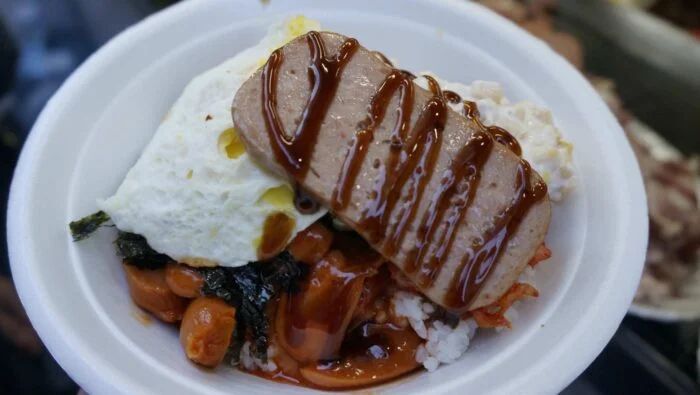Receta de Arroz a la milanesa con salchichas