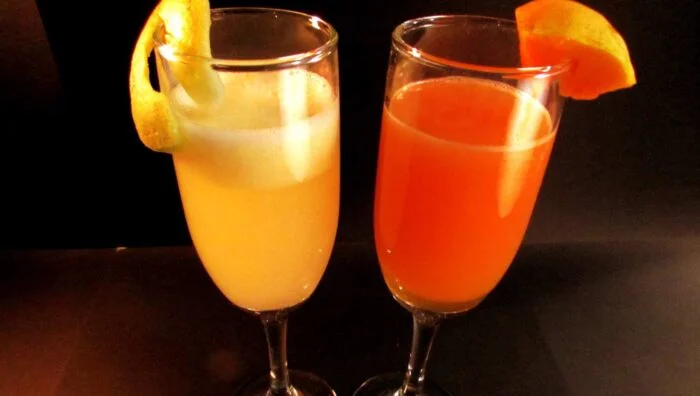Cóctel de licor de fruta, naranja y pomelo