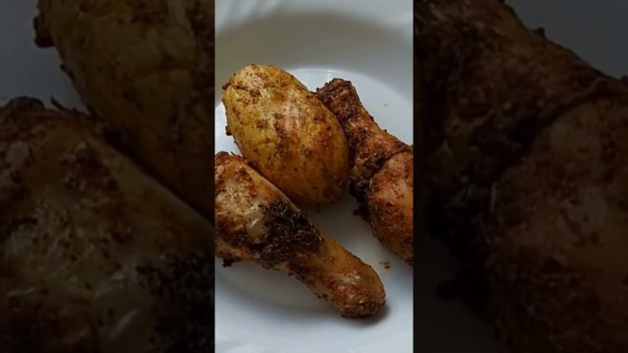 Pollo con patatas en freidora de aire.