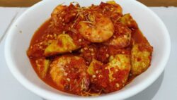 Lomos de merluza al horno con costra de queso parmesano y tomates secos