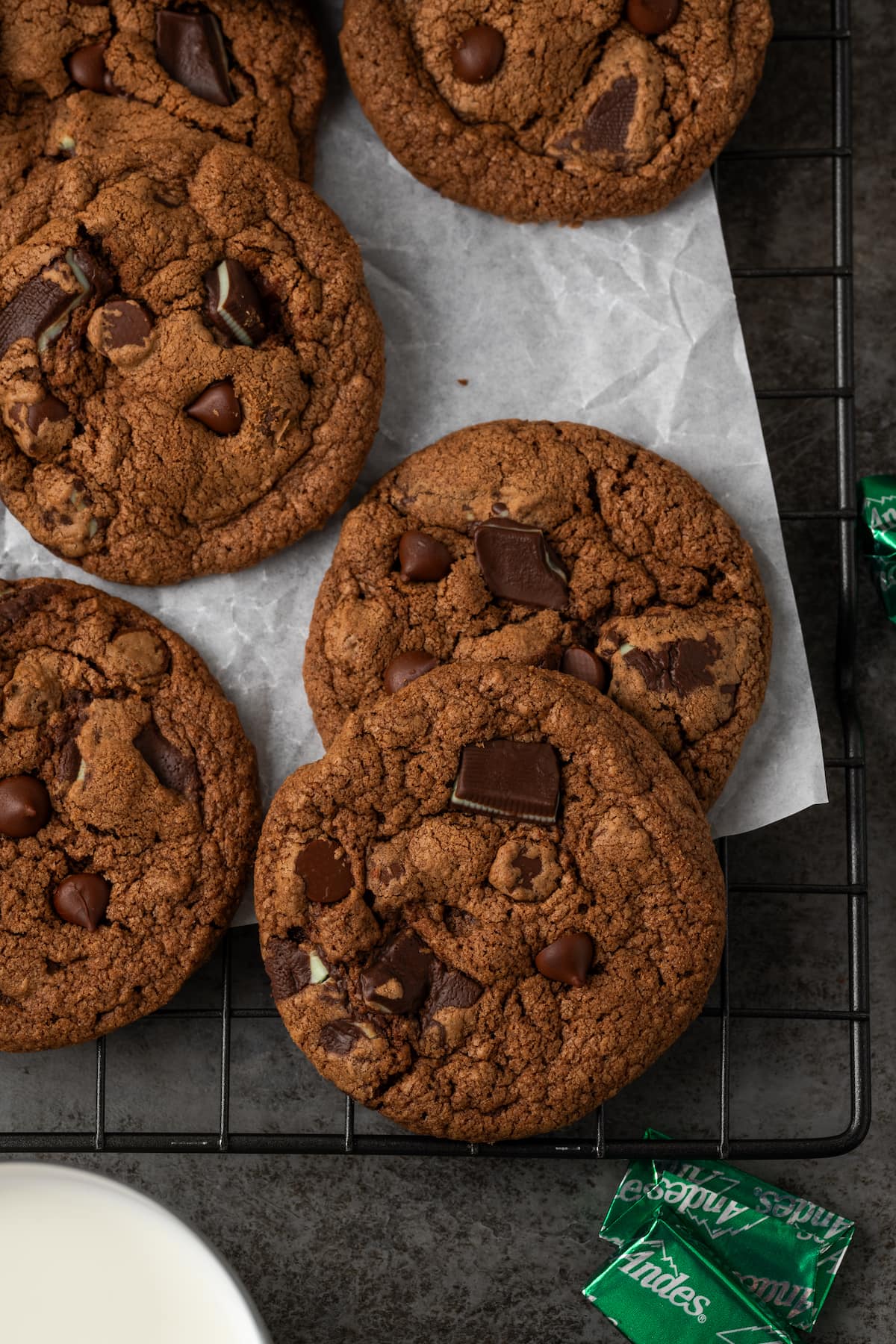 Overhead view of double chocolate mint cookies on a wire rack.