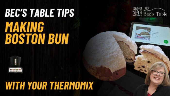 Soft Boston Bun topped with fluffy white icing and coconut