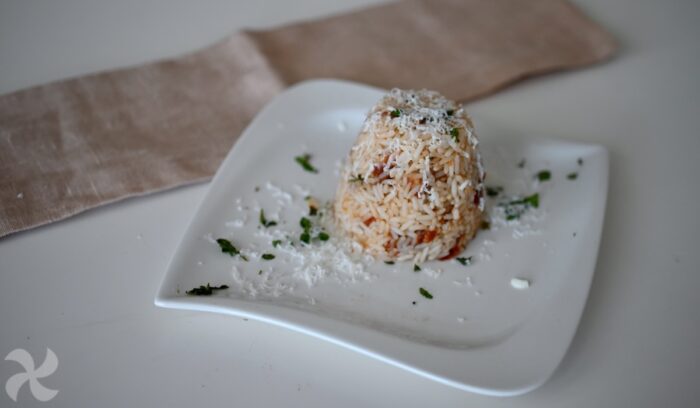 Guarnición de arroz con tomates secos